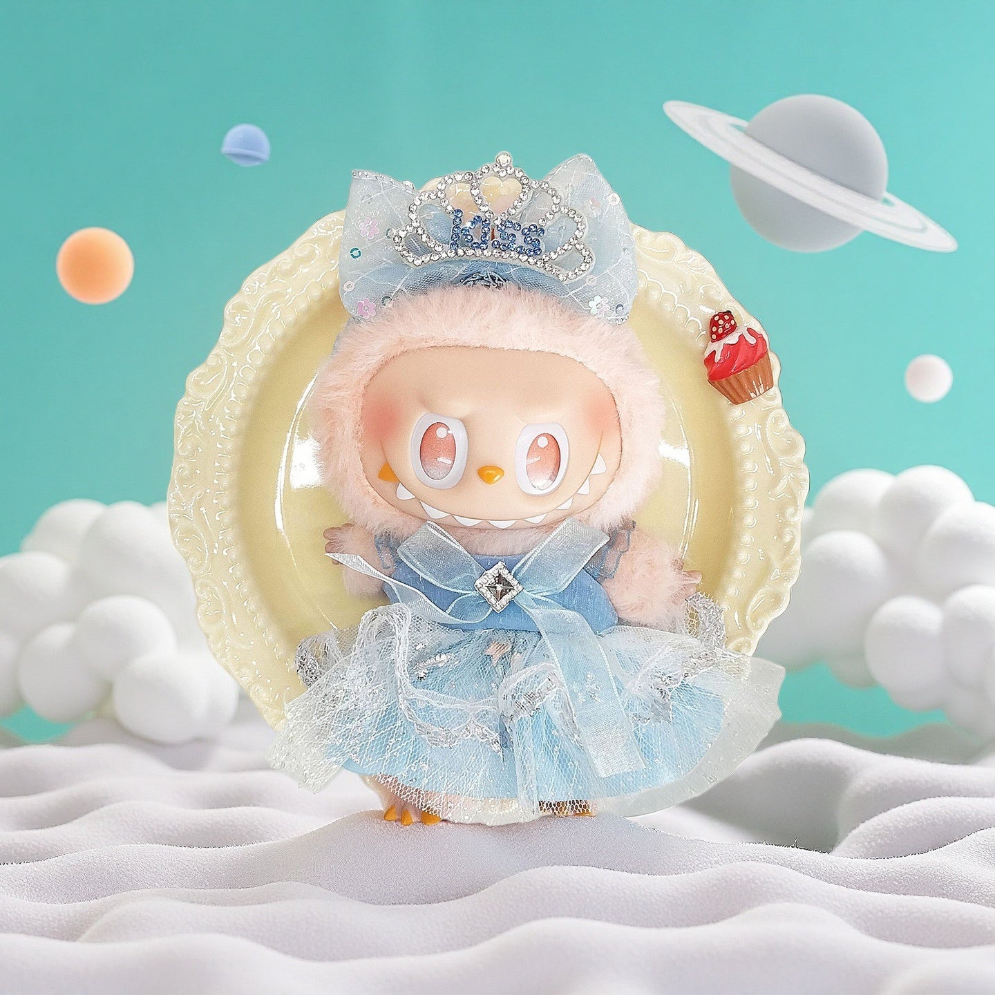 A ZoDoll Labubu plush in an Ice Blue Princess Lace Tutu Dress with Rhinestone Tiara stands before a decorative plate, surrounded by fluffy clouds and a Saturn-like planet in the pastel background.