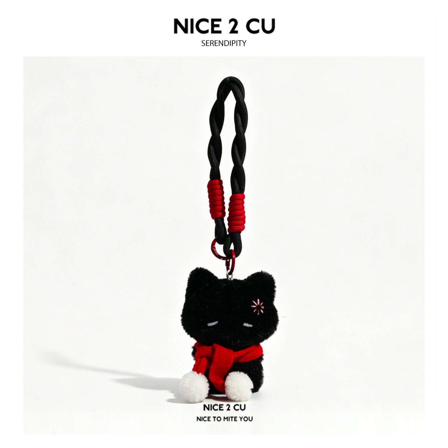 Kawaii black cat plush charm pendant wearing a red and white striped fringed scarf, hanging from a black braided cord with re