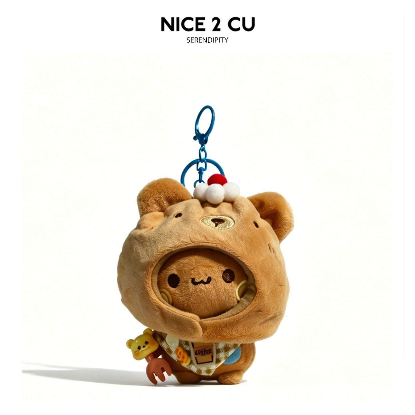 Brown kawaii plush animal keychain charm wearing a full bear-head hood costume with red pom-pom and blue clip