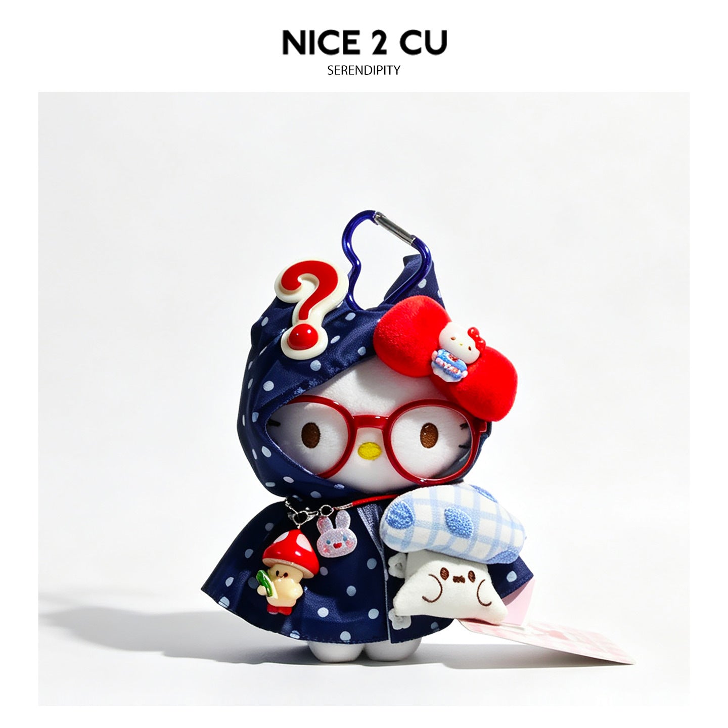 Navy blue polka-dot raincoat kawaii cat plush charm with mushroom accessories, red bow, and question-mark hood topper