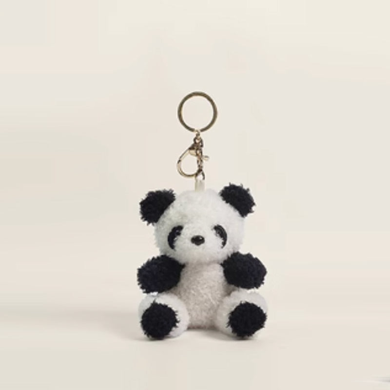 Bare panda plush charm without sweater shown with metal key-ring and clasp attachment