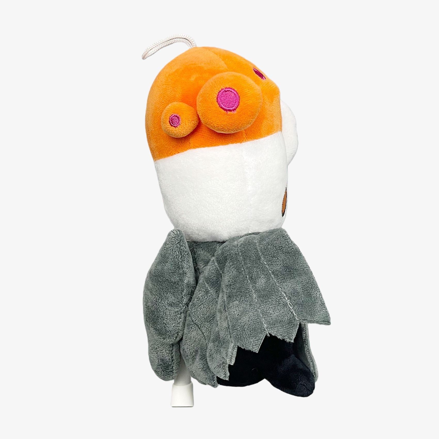 The Officially Licensed Hollow Knight Plush Doll features an orange mushroom bug character with a gray cloak, by Hollow Knight. This soft, 8.27-inch collectible stuffed toy makes the perfect gift for fans.