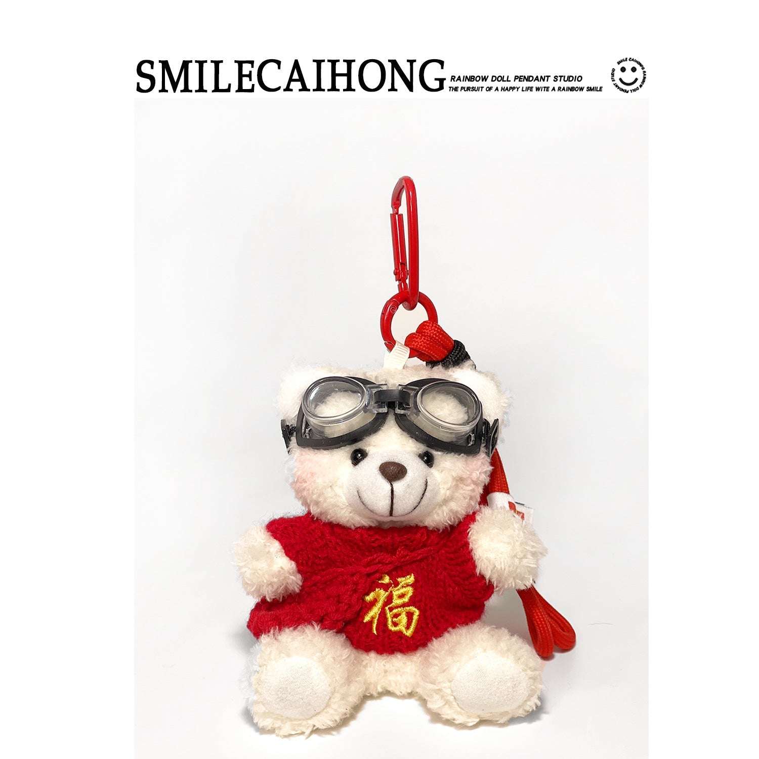 White plush teddy bear pendant in red robe with yellow 福 character embroidery and aviator-style goggles