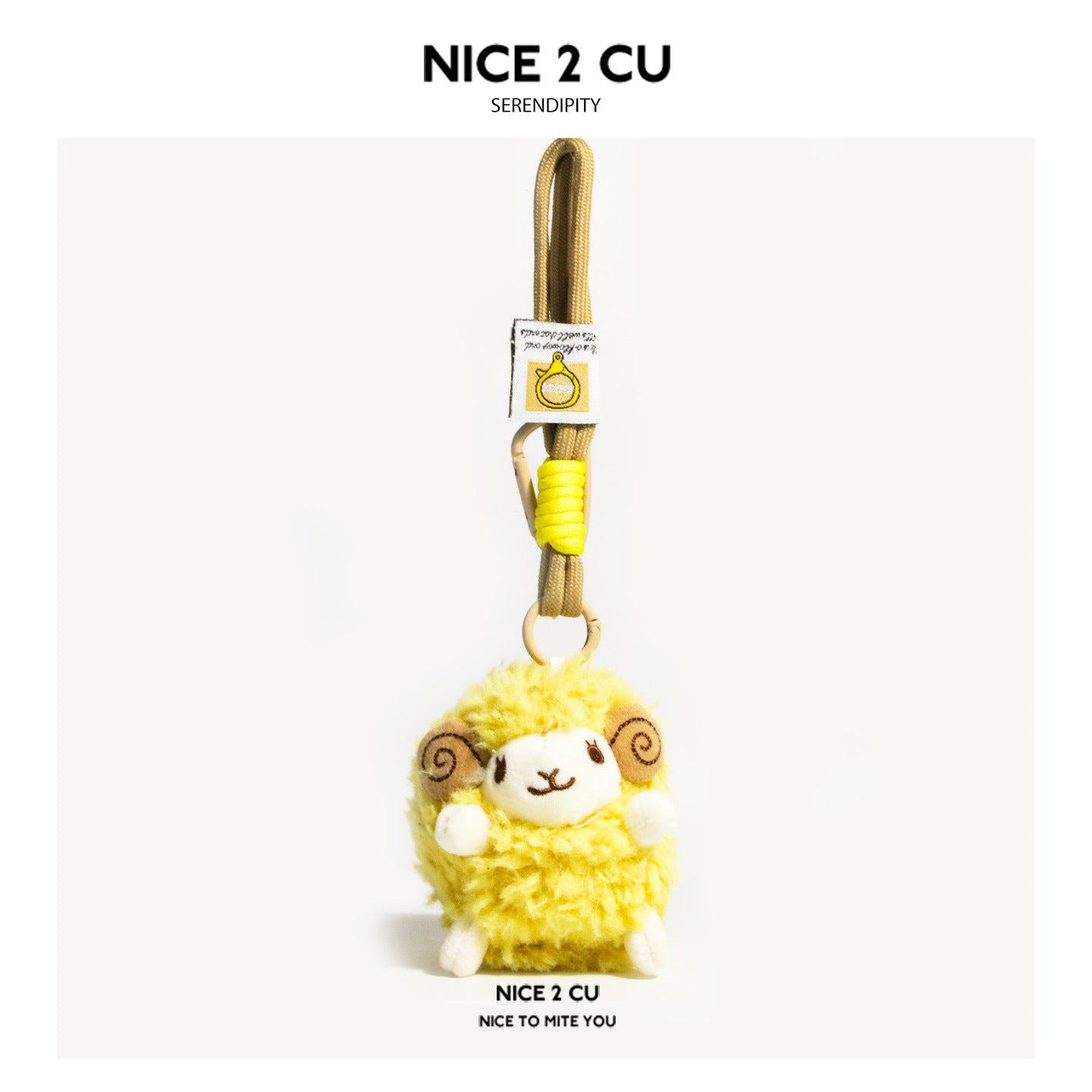 Yellow chubby sheep plush charm with white face, beige spiral ears, and hanging loop ring