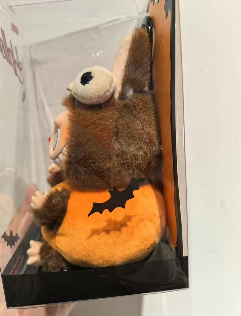 Side view of POP MART’s THE MONSTERS – Happy Halloween Party Labubu 15cm Vinyl Plush Keychain (Pumpkin Edition) in a display box, dressed in festive costume—a perfect Halloween collectible keychain.