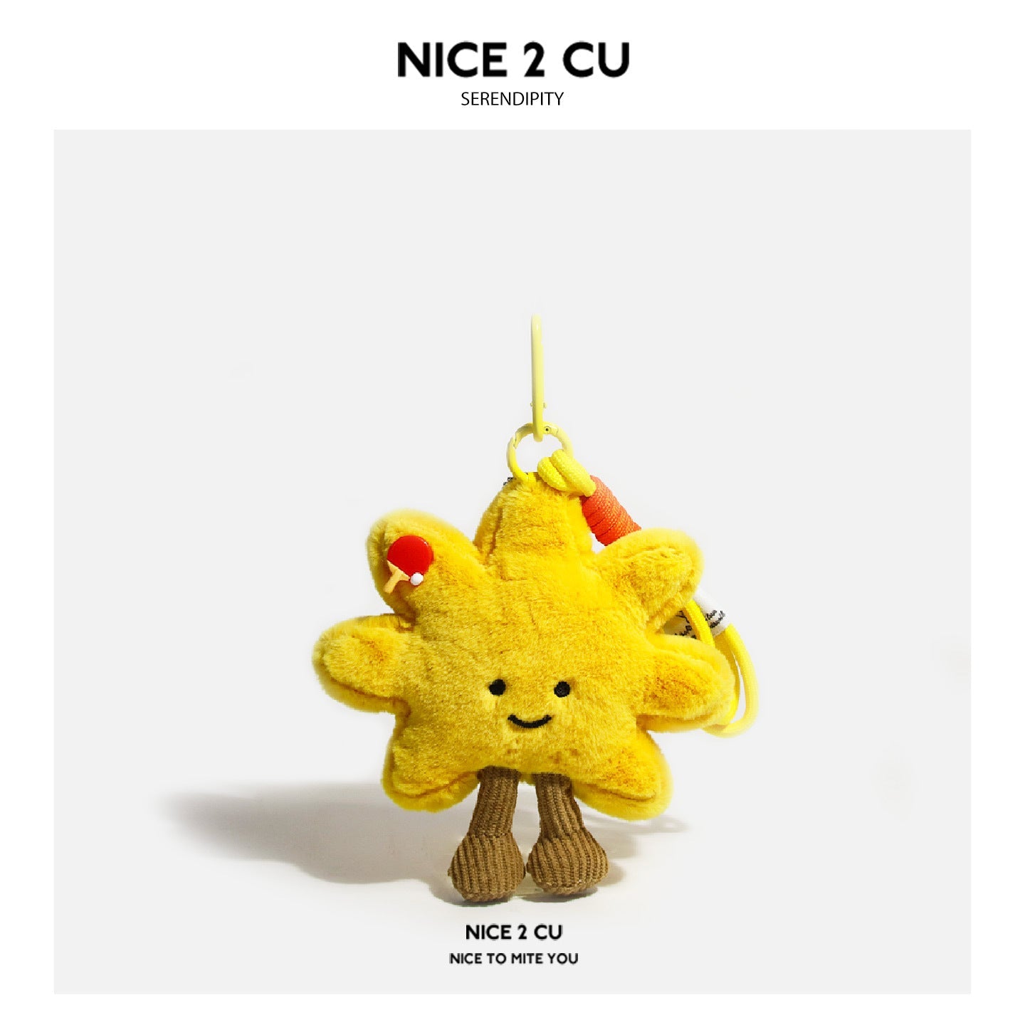 Yellow sunflower plush charm with a small ping-pong ball motif and yellow strap clip