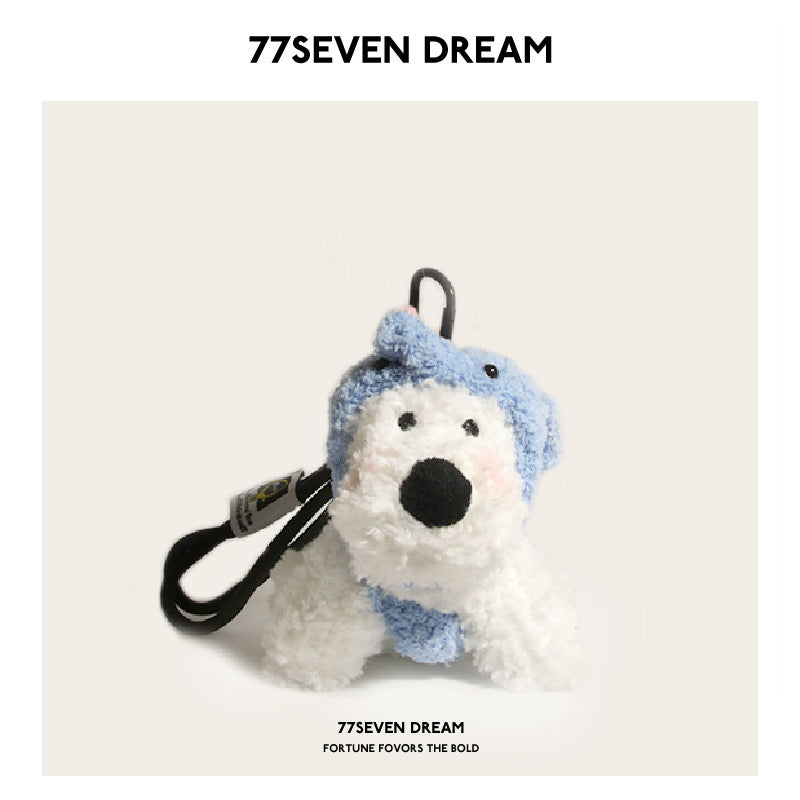 White Westie plush bag charm in a light blue elephant costume hood with black strap