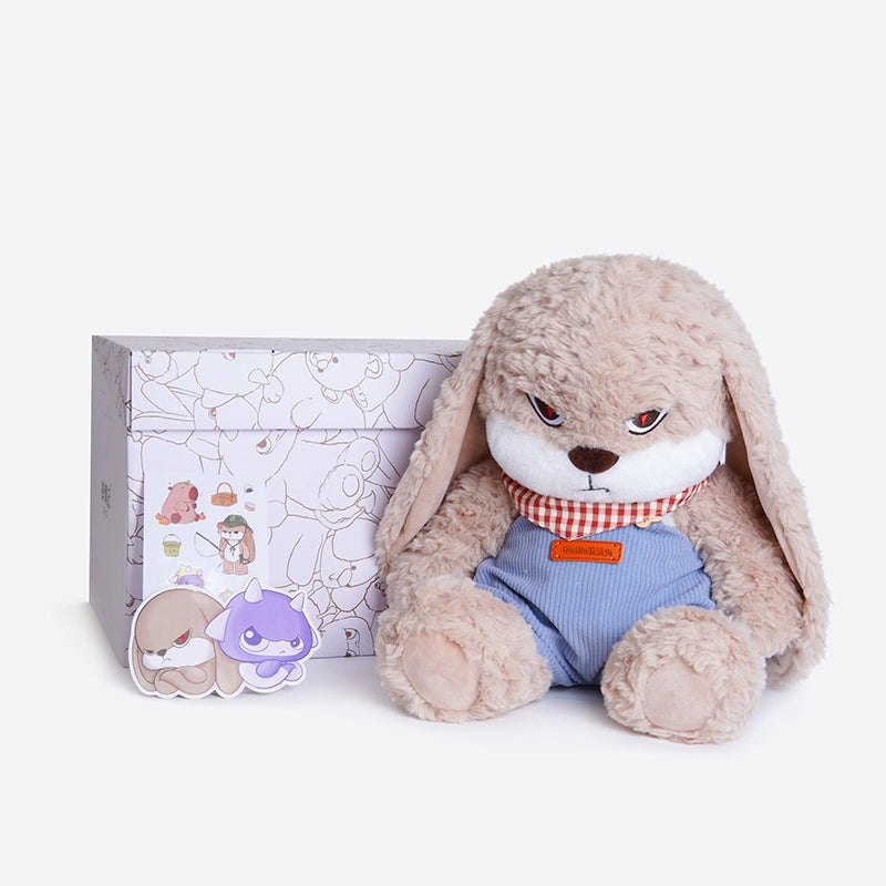 The ZEIO Bunny Plush Toy 33cm, a soft rabbit in overalls with expressive eyes, sits beside a decorated box and two character pins—ideal as adorable nursery decor.