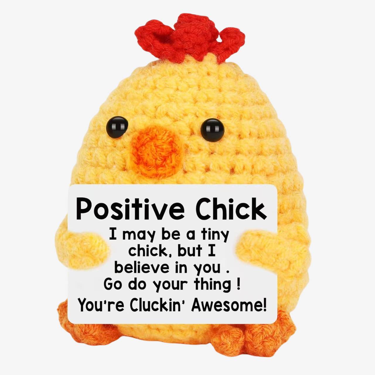 The ZoDoll Positive Chick Crochet Amigurumi is a handmade yellow plush with red accents, holding a “Positive Chick” sign. This adorable gift delivers eggstra encouragement—reminding you that you’re cluckin’ awesome!.