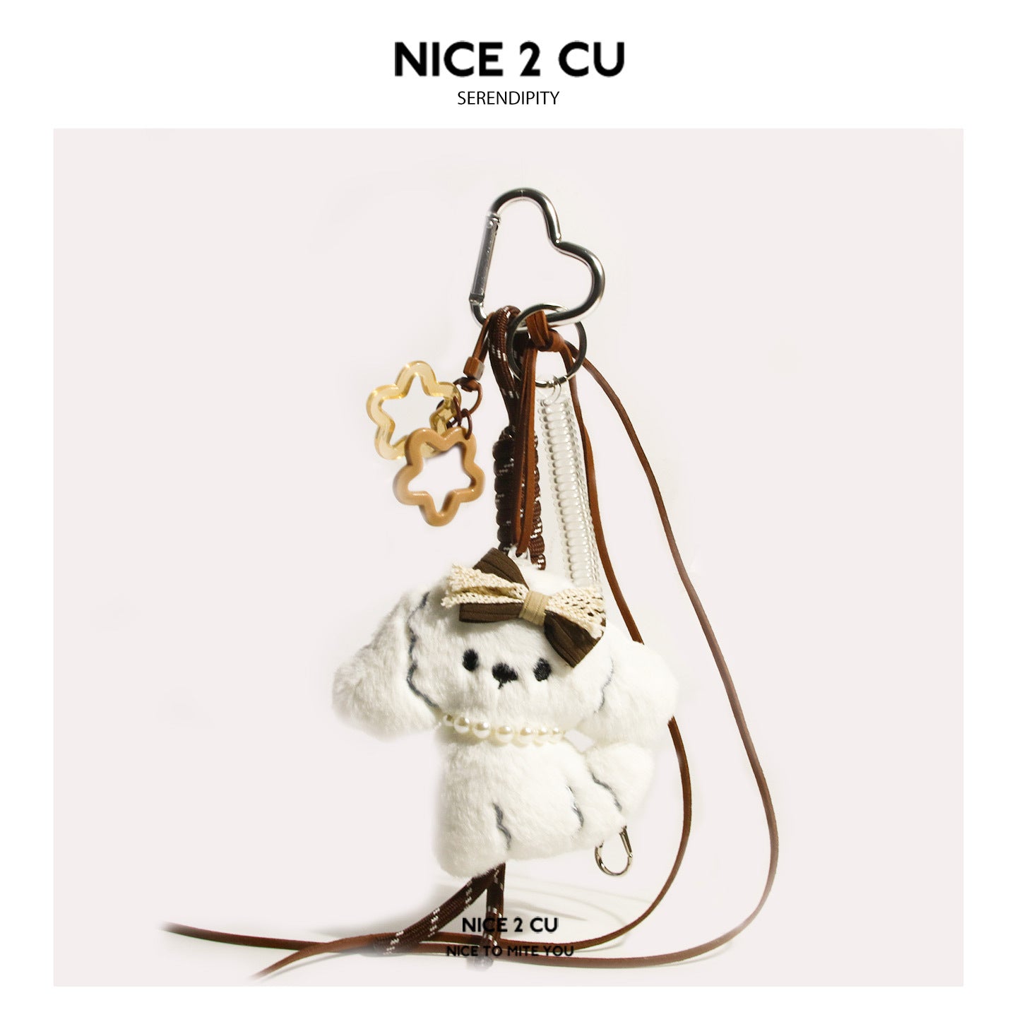White plush dog charm with pearl necklace, double star charms, heart carabiner clip, and braided brown cord