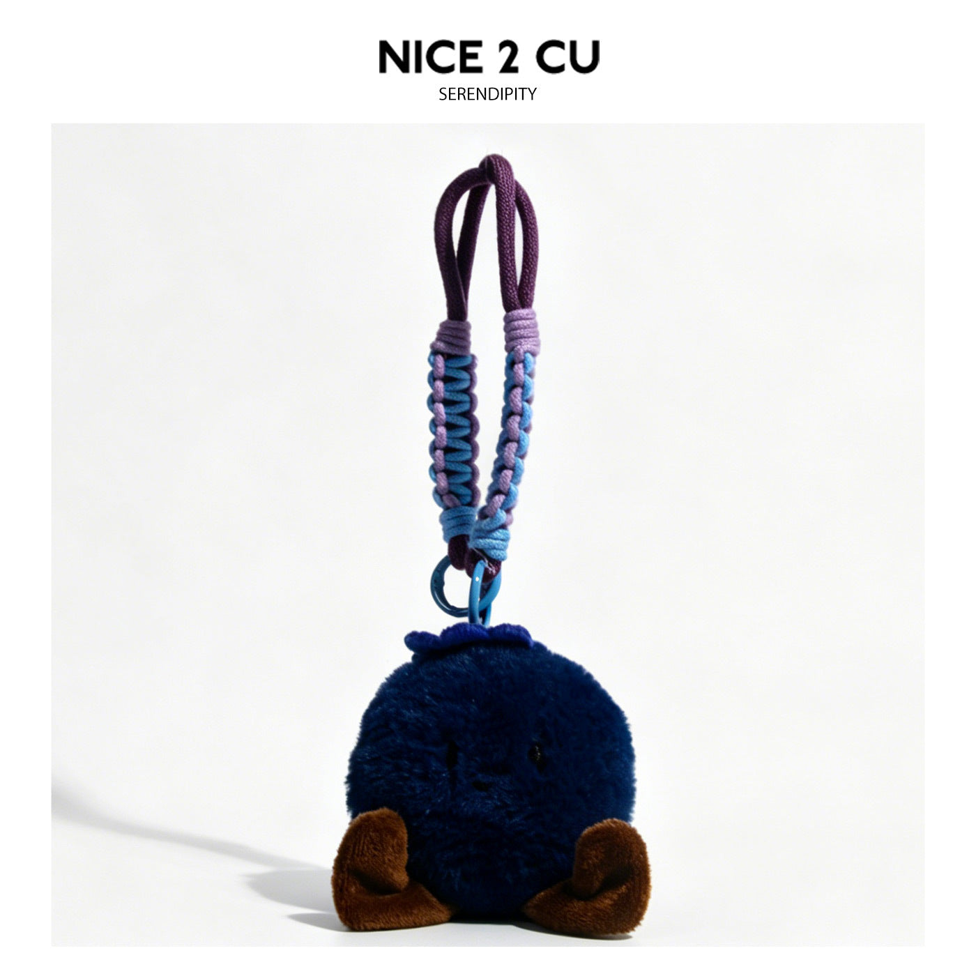 Navy blue round blueberry kawaii plush charm with gathered crown, brown stubby limbs, and two-tone purple and blue braided ca