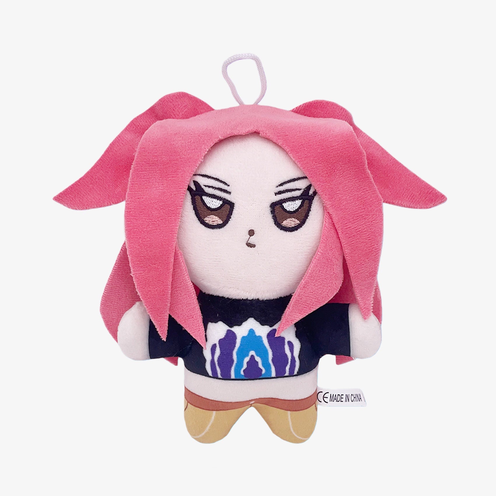 The Demon Hunters Anime Plush Doll is a 7-inch soft stuffed toy featuring a pink-haired, long-eared female character with large eyes, colorful shirt, tan pants, and a hanging loop. Collectible Character Series by Demon Hunters. White background.