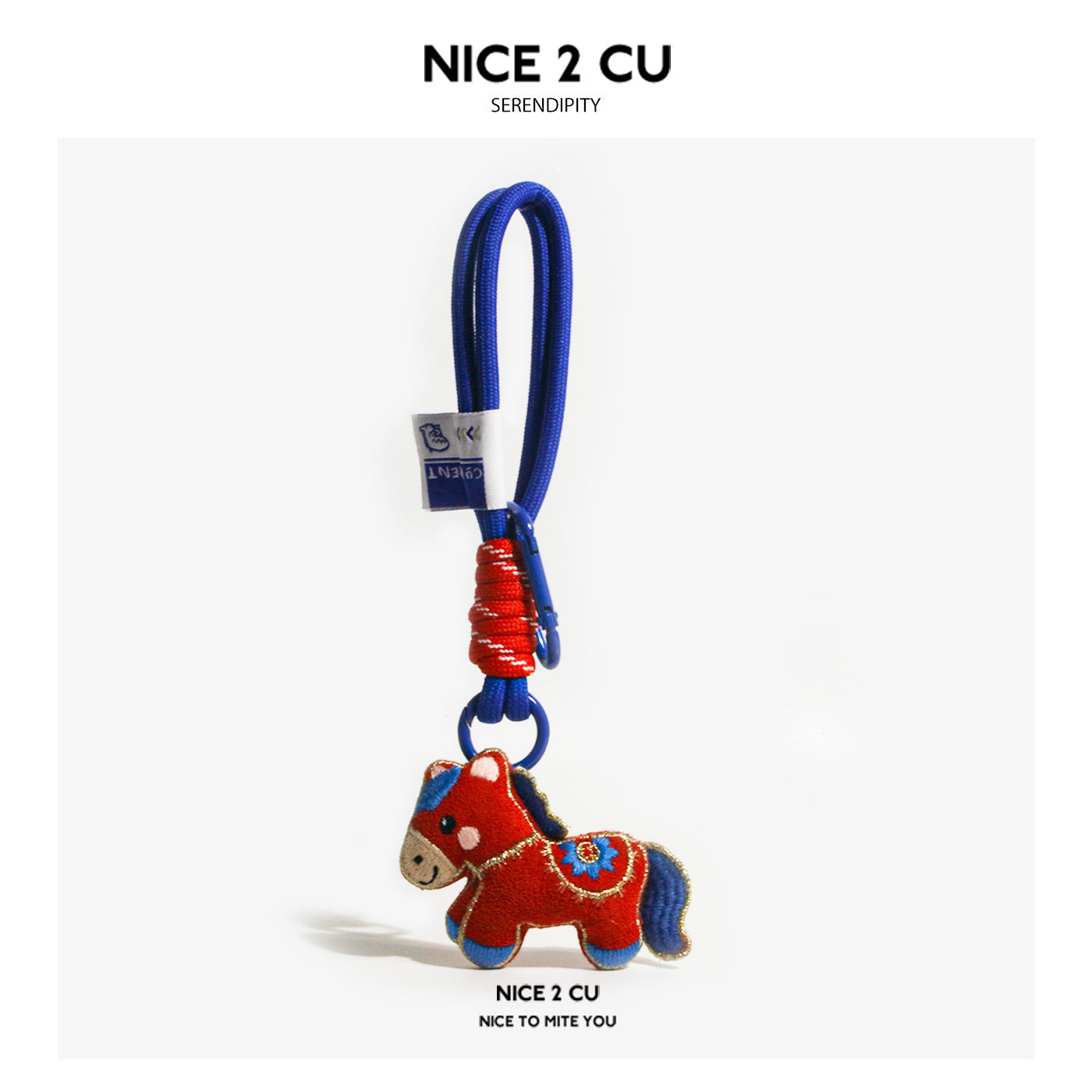 Bold red and blue fabric horse charm with blue braided cord and multicolor accents