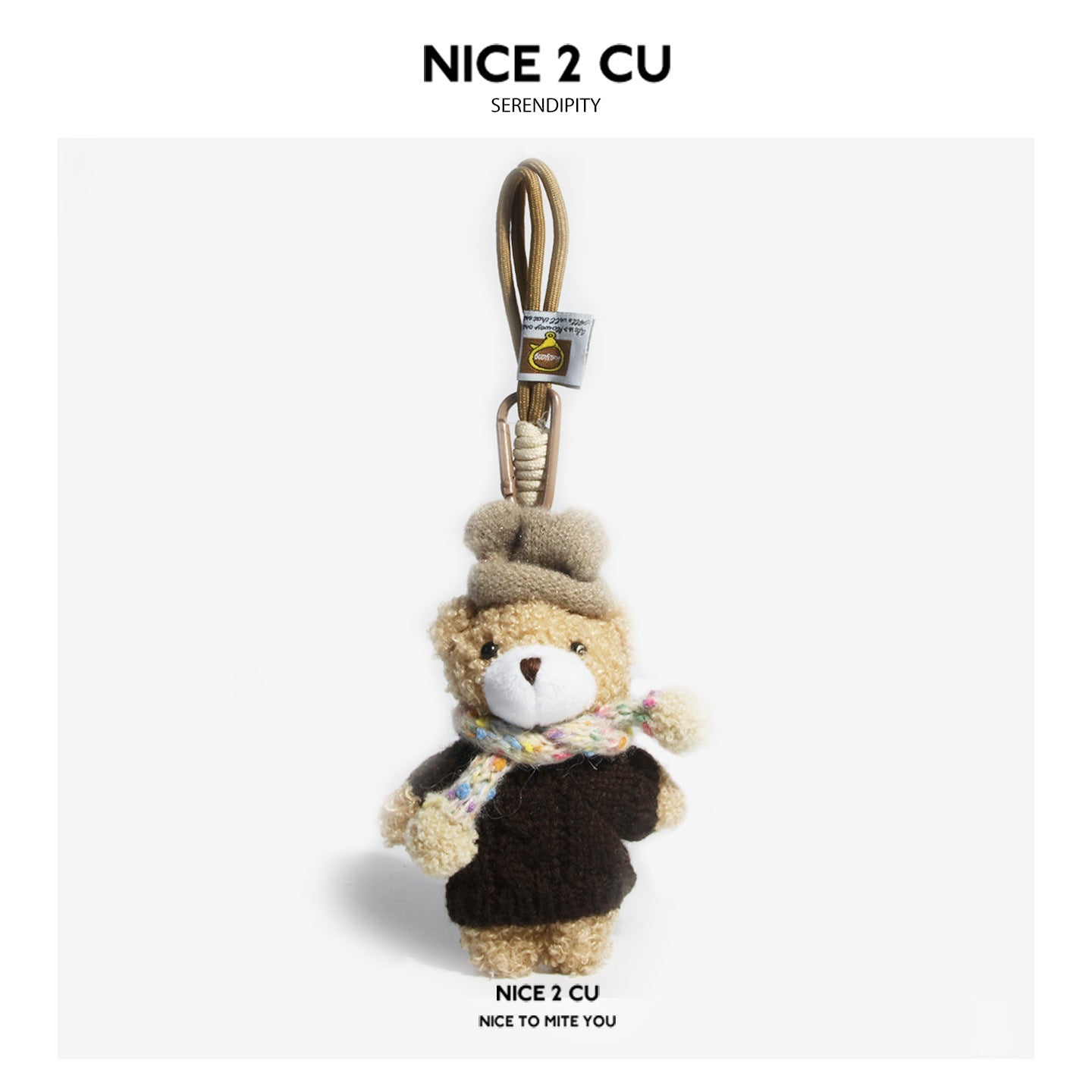 Plush teddy bear keychain charm with coffee brown hat, dark brown sweater, and multicolor scarf on loop strap