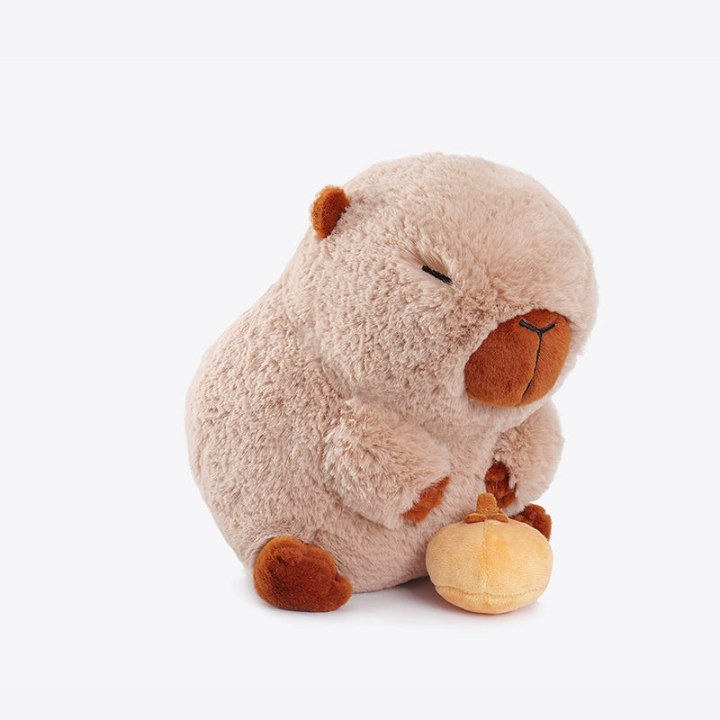 The ZEIO Capybara Plush Toy 25cm is a soft, light brown capybara stuffed animal with closed eyes and a cute beret, seated against a plain white background.