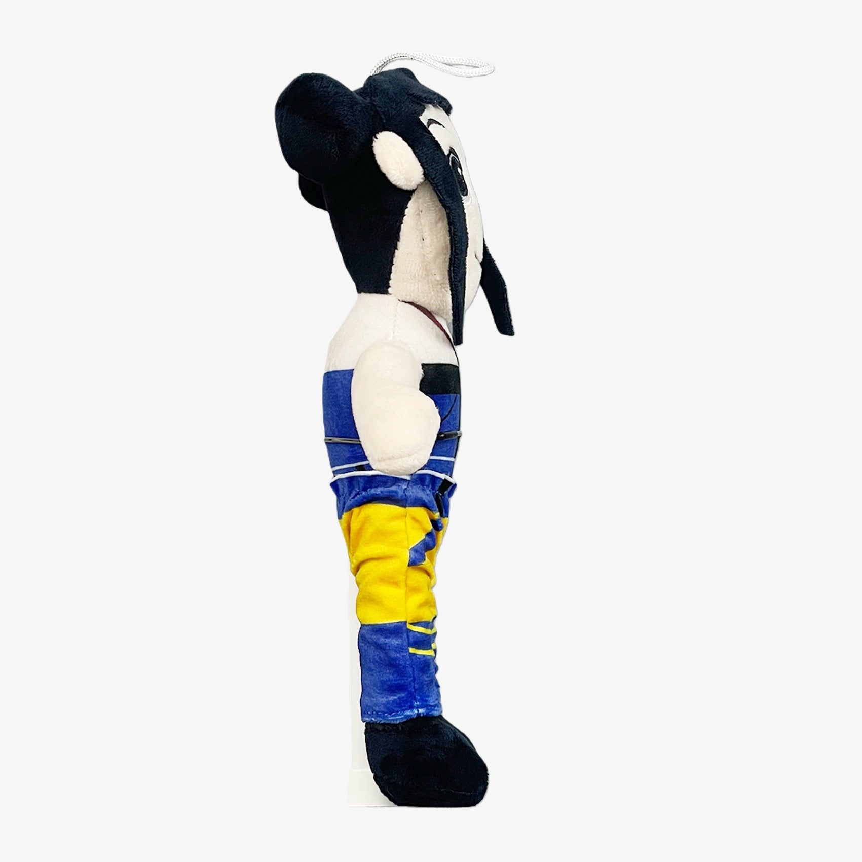 The Demon Hunters Anime Plush Doll is a 10.6-inch female character in a blue & yellow outfit, with a hanging loop—perfect for fans and collectors of anime character dolls.