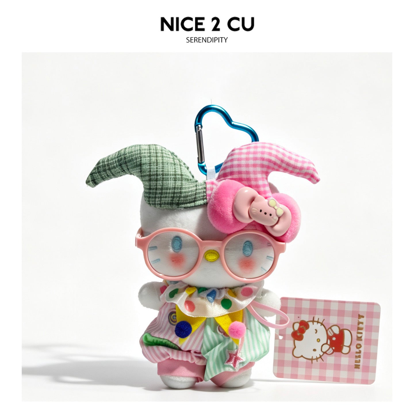 Pink and green checkered circus cat character figure charm with colorful ruffled collar and heart carabiner clip