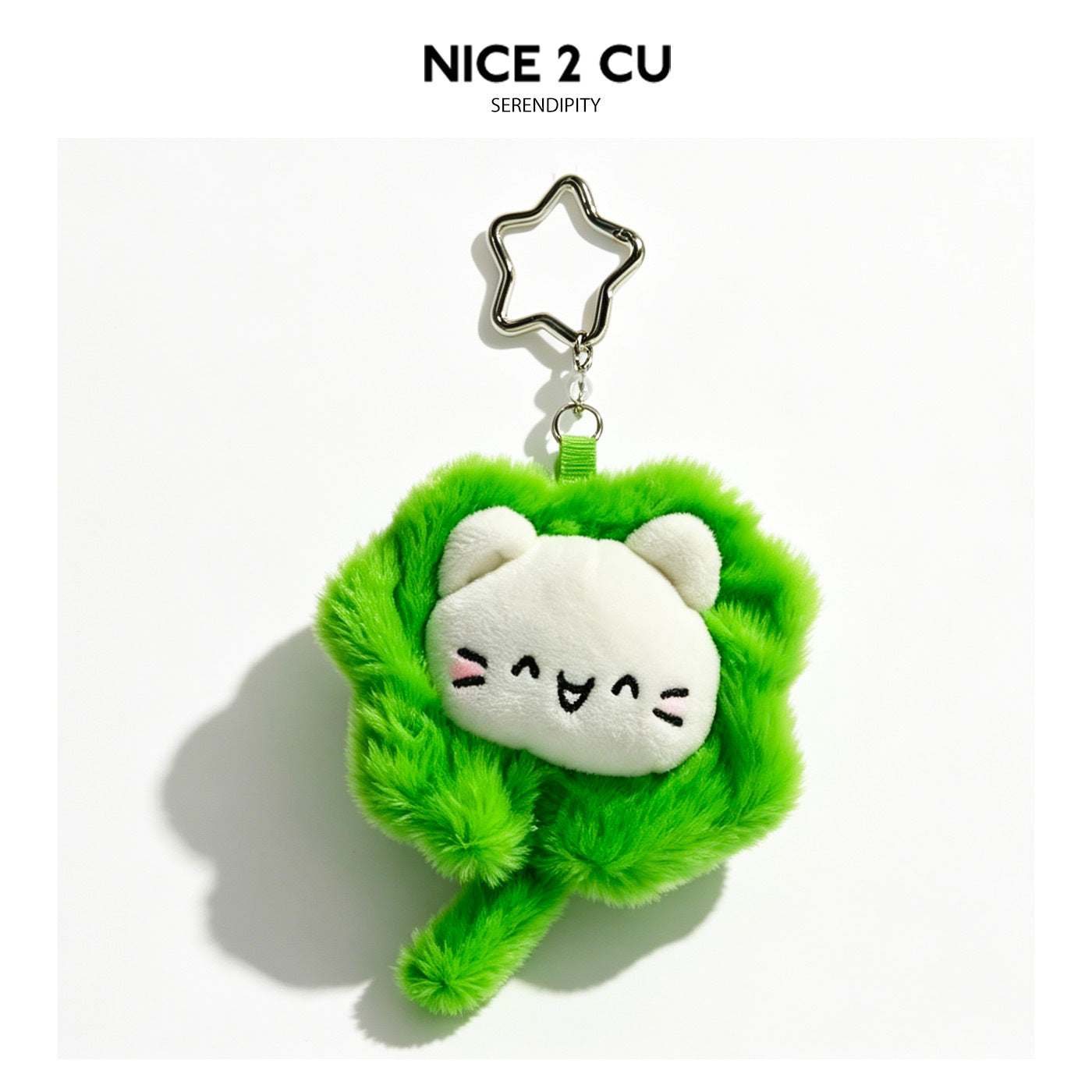 Kawaii white cat face plush charm shaped like a bright green four-leaf clover with a star-shaped silver carabiner clip