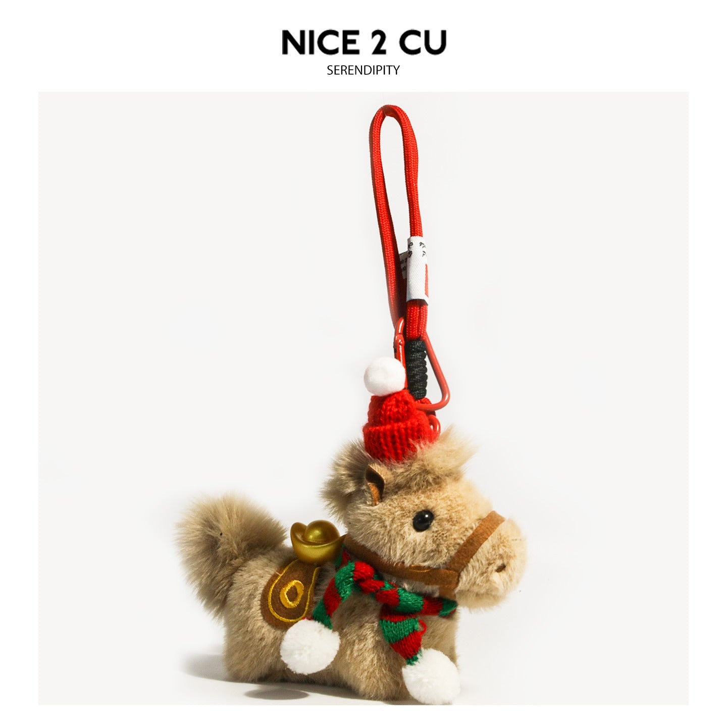 Plush brown horse pendant charm with red-and-green striped knitted scarf, white pom-pom hat, and red carabiner hook clip