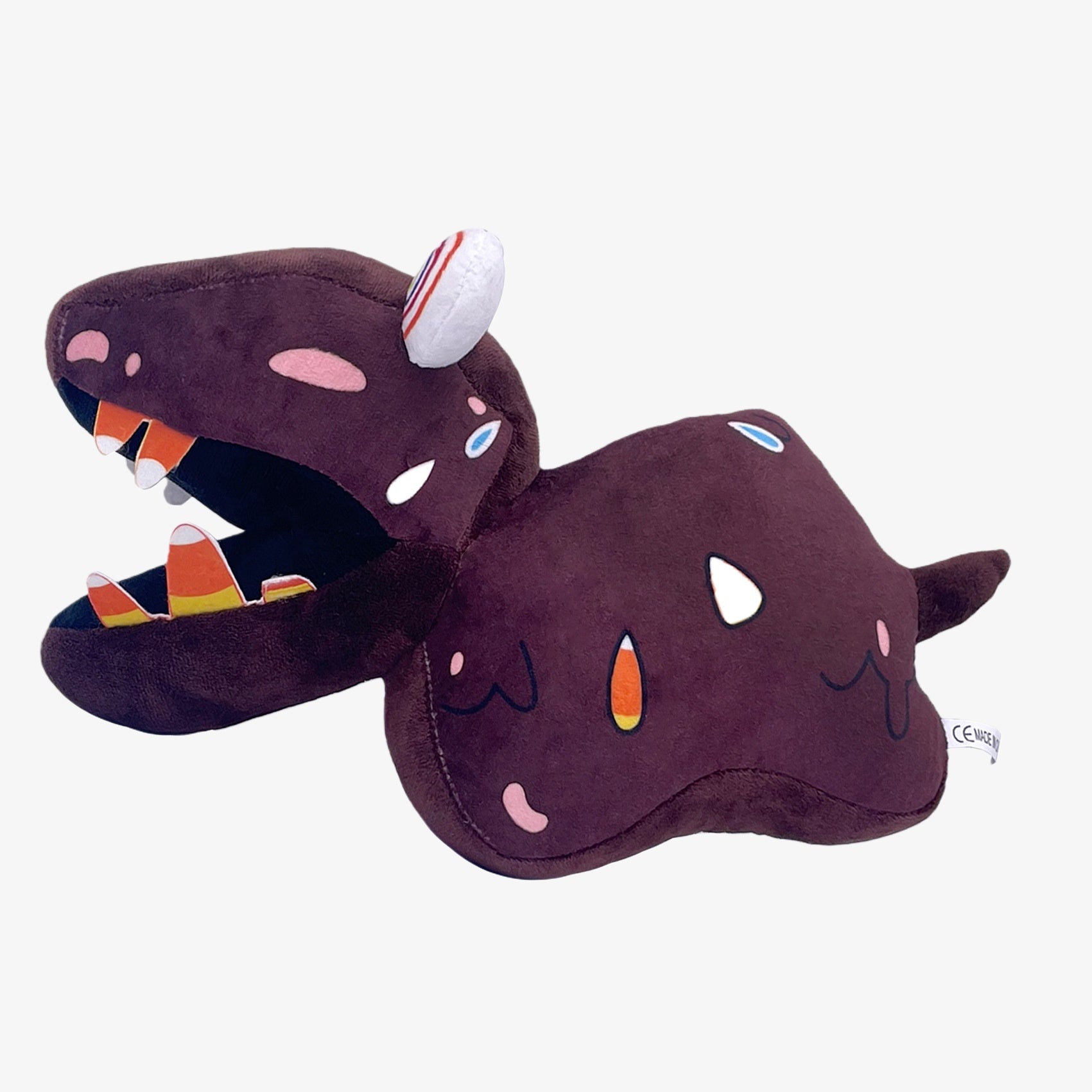 The Amazing Digital Circus Inspired Plush Toy: a 9.8-inch brown monster cartoon doll with a big mouth and funny details—a quirky collectible from The Amazing Digital Circus.