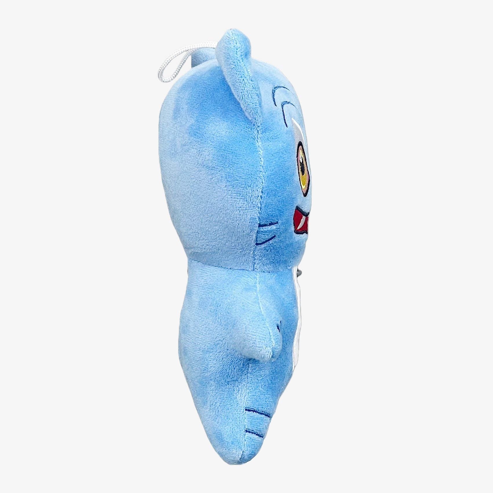 The Demon Hunters Inspired Monster Plush Toy features an anime-style blue creature with a hat, cartoon-like face, and stitched details, shown in a side profile view with a rounded body. Available in lying and standing poses.