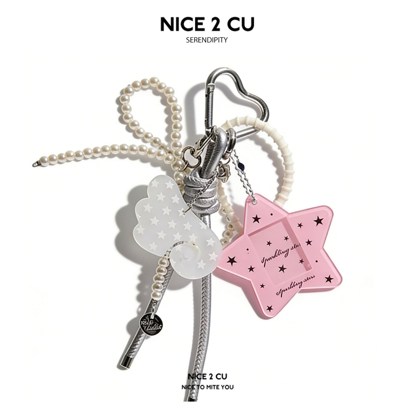 Pink star-shaped acrylic card holder keychain charm with black star prints, pearl beads, cloud charm, and silver heart clip