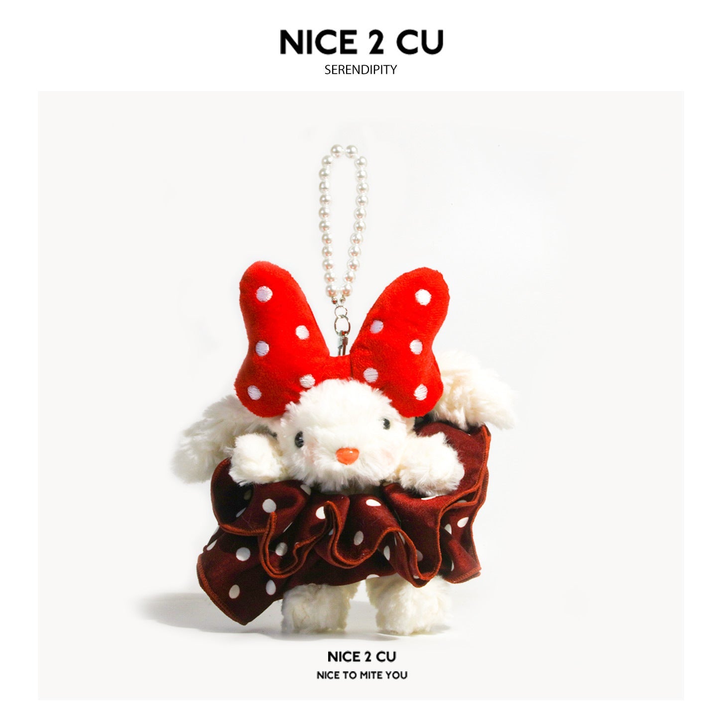 Kawaii white lop-eared rabbit plush charm in a red polka-dot ruffled skirt with matching polka-dot ears and pearl-style hangi