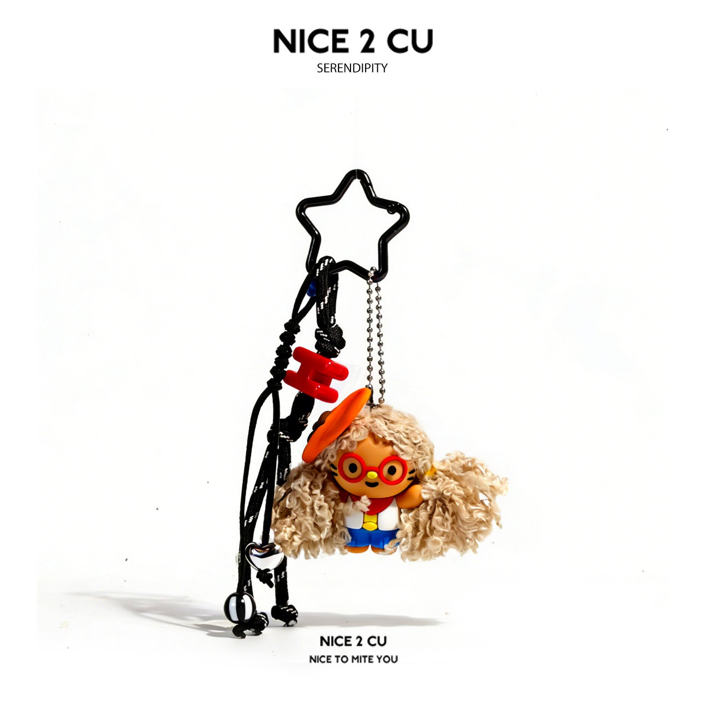 Brown fluffy-haired hanging character charm with black star hanger, red glasses, and blue outfit