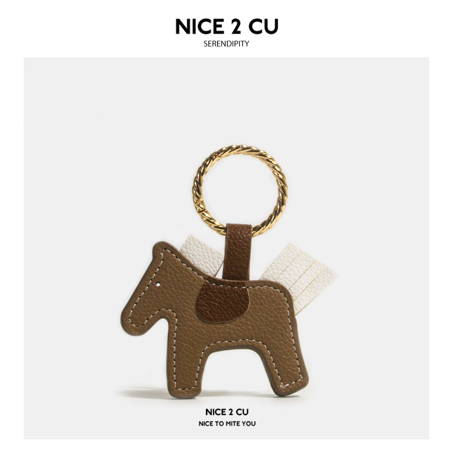 Dark brown and cream leather-look horse keychain charm with twisted gold-tone ring and cream back flaps