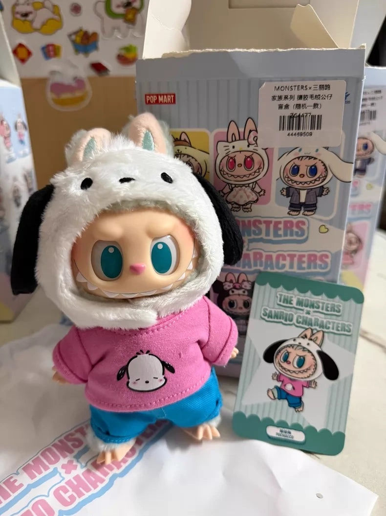 The POP MART LABUBU Hello Kitty and Friends Series Pochacco Plush Pendant Figure comes with a box and character card, featuring The Monsters x Sanrio Characters branding—ideal as a cute collectible or kawaii accessory.