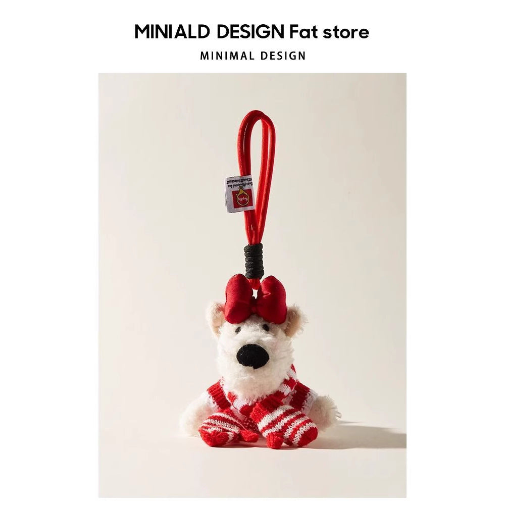 White terrier plush bag charm with red bow and red and white striped scarf and mittens, holiday ornament