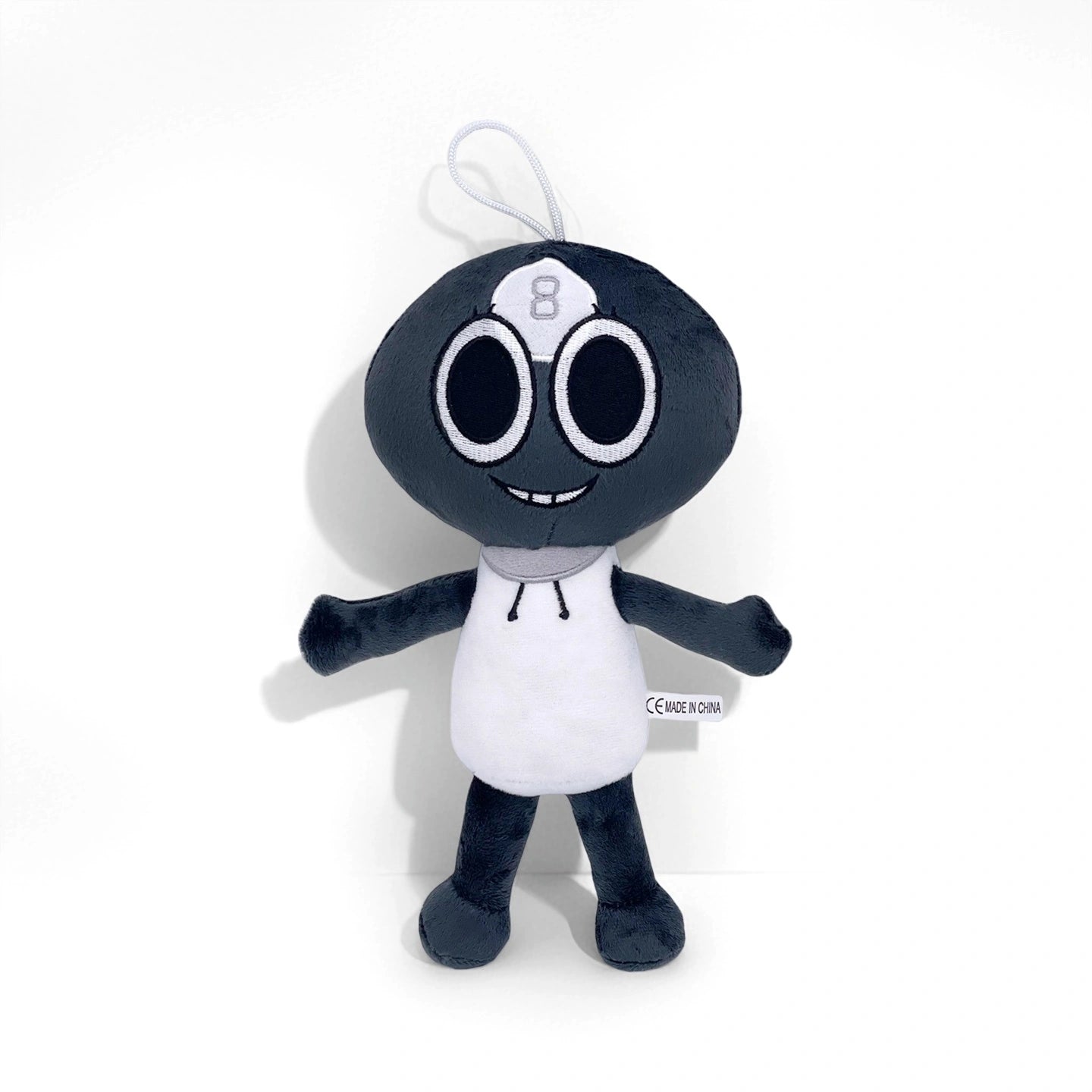 A soft collectible plush from Dandy's World Plush Collection, featuring a black head and body, big round eyes, a smiling mouth, and a white outfit with the number 8—sold individually. Perfect for Dandy's World fans!.