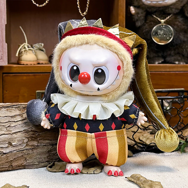 The ZoDoll Labubu Circus Clown Harlequin Doll features a red nose, painted cheeks, striped and diamond-patterned costume, ruffled collar, and velvet two-tone jester hat, posed indoors in a miniature theater art scene.