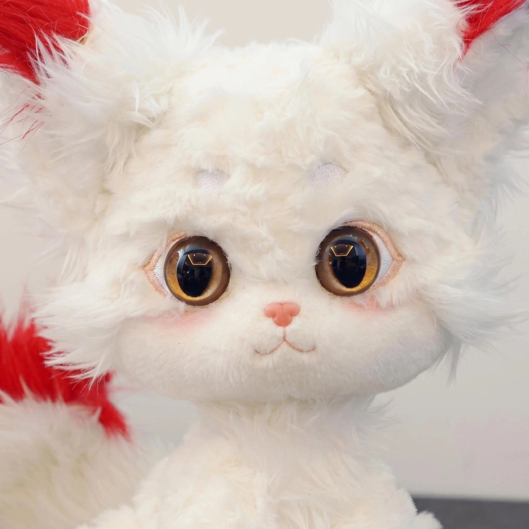 The ZoDoll White Fox Plush Toy is a cute Arctic fox stuffed animal with big ears, large eyes, a pink nose, and a fluffy red-and-white tail, shown against a plain background.