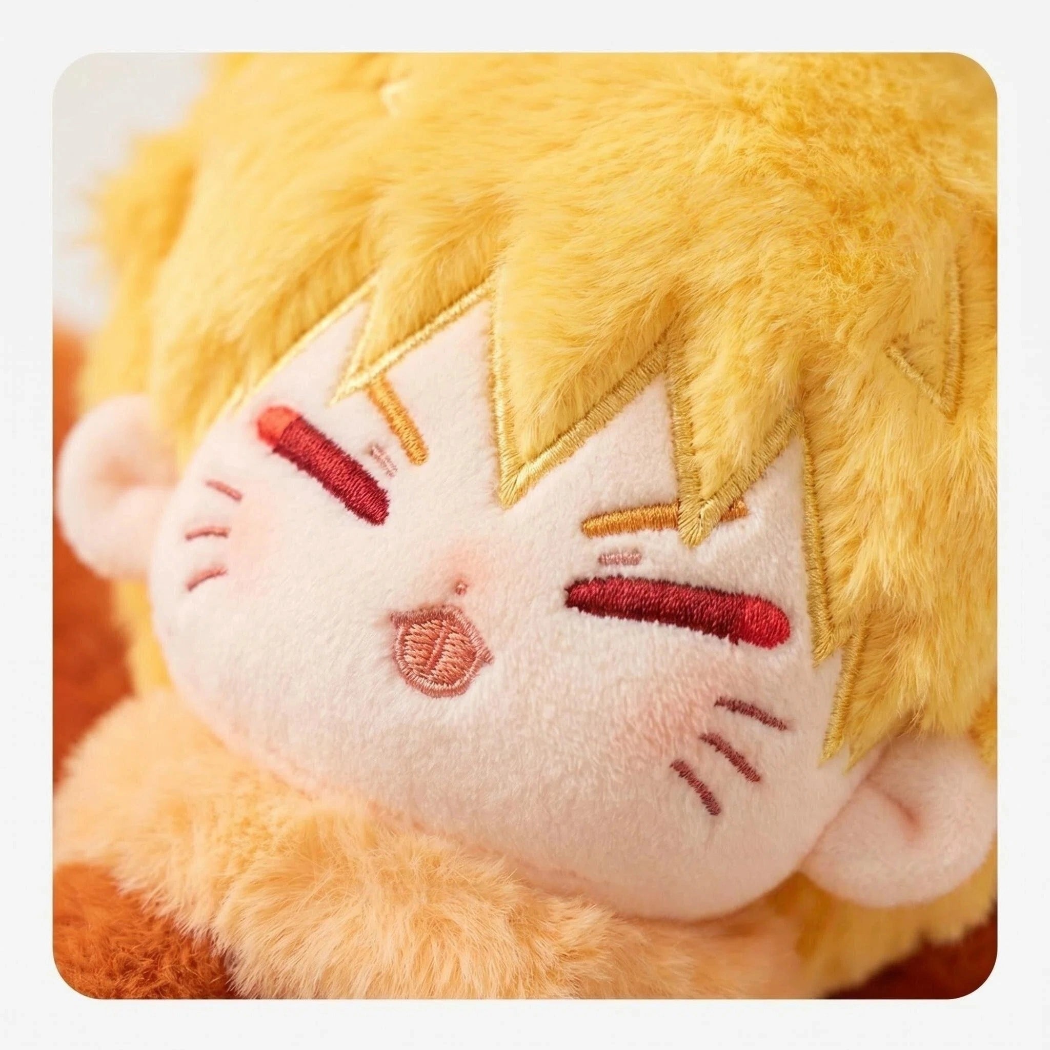 A close-up of the ZoDoll Nine Tailed Fox Plush—an adorable anime fox toy with nine tails, blond hair, embroidered eyes, and whisker-like cheek marks—set against a plain background.