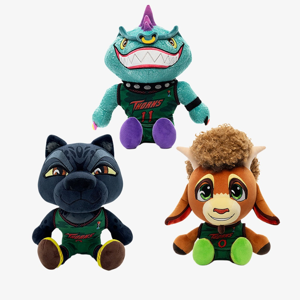 The ZoDoll GOAT Sony Thorns Plush Toy Collection features a teal dinosaur, black panther, and brown plushie in black and green sports jerseys (20cm x 24cm), perfect as cute collectible stuffed dolls against a white background.