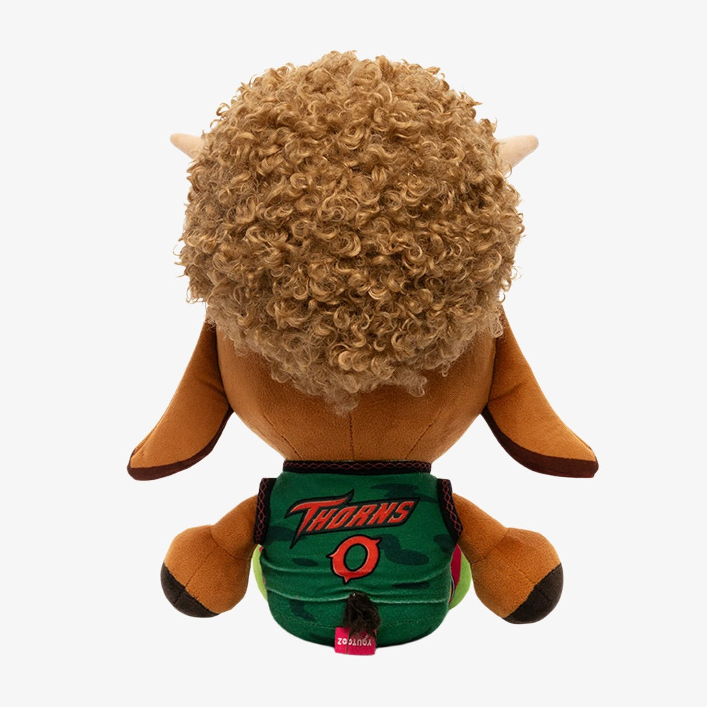 The ZoDoll GOAT Sony Thorns Plush Toy Collection features a 20cm x 24cm soft doll with curly brown hair, brown limbs, horns, and a green jersey with "THORNS" and a red-green logo—shown from the back.