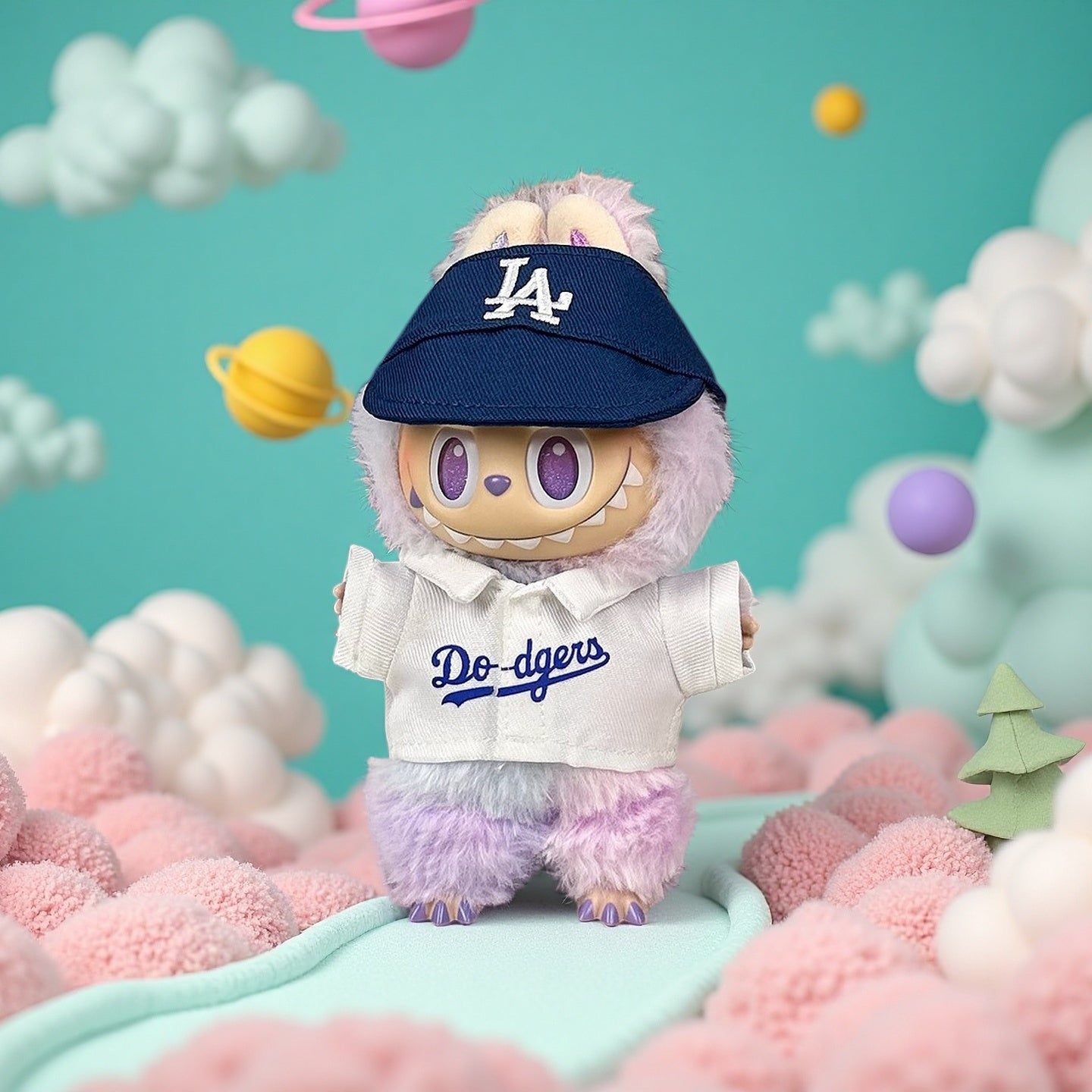 The ZoDoll Labubu Doll wears a Dodgers Baseball Jersey & LA Visor Cap Outfit, posed on a pastel landscape with clouds and floating planets—ideal for kawaii plushie accessory fans and LA Dodgers enthusiasts.