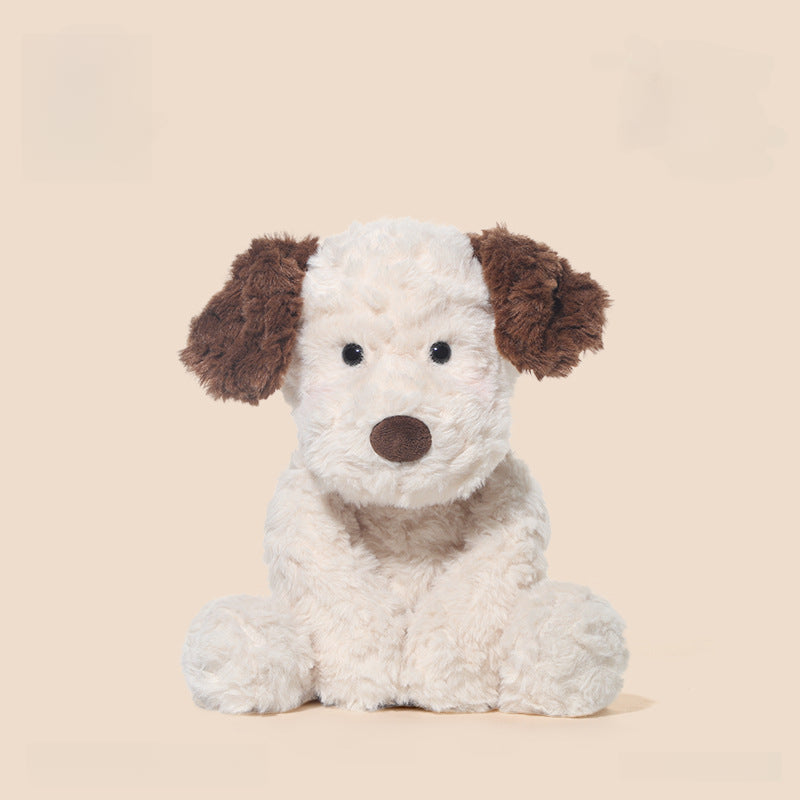 The JOOKI 35cm Plush Puppy Stuffed Toy, a soft brown and white dog with floppy ears, sits upright against a plain beige background.