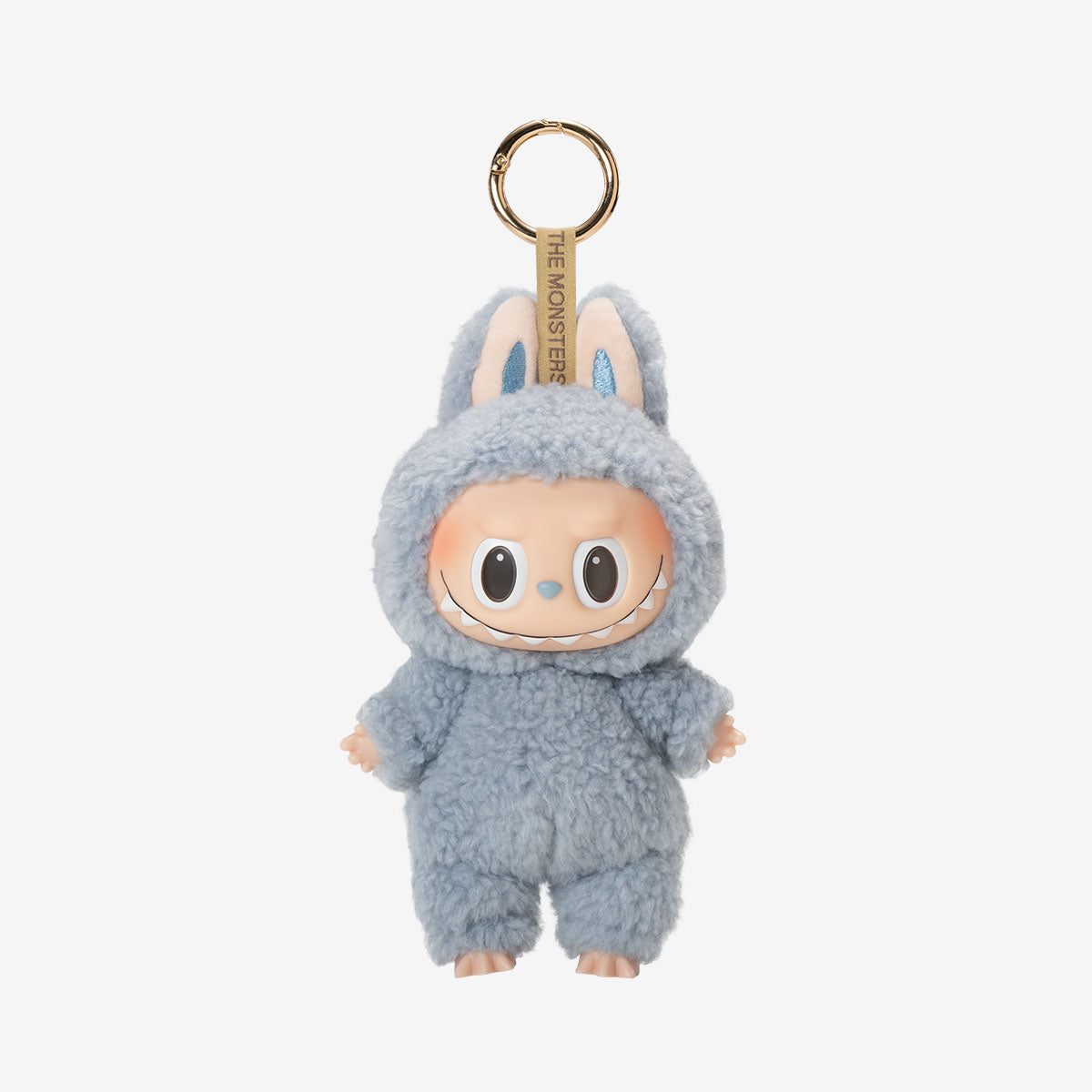 The Labubu “Sea Salt Coconut” Plush Keychain by POP MART features a standing bunny in a blue sherpa monster costume with big eyes and small ears, complete with a gold key ring—perfect for adding kawaii style to your bag or keys.