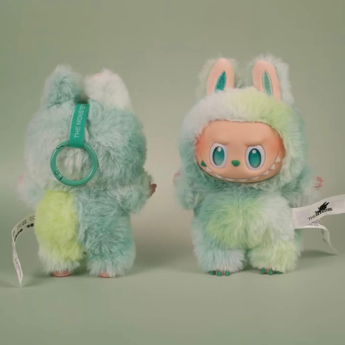The Labubu “Serenity” Plush Keychain from POP MART’s The Monsters “Big Into Energy” Series features mint bunny fur, round faces, and big eyes—perfect as a cute bag charm or collectible accessory.