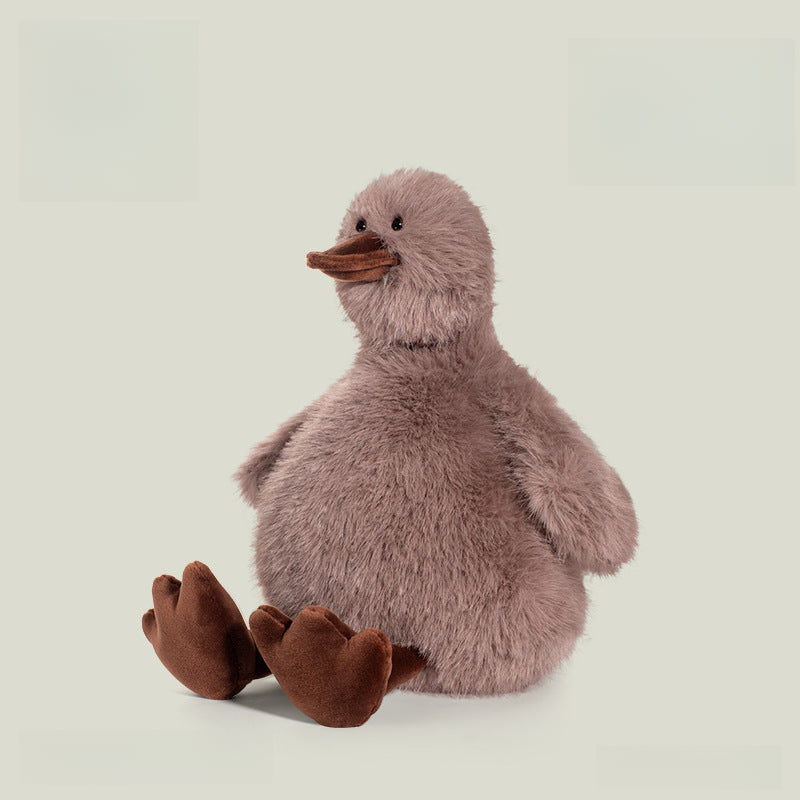 A must-have for plush collectors, the JOOKI 20cm Fluffy Duck Plush Toy features soft brown and grey fur, a dark brown beak, and matching webbed feet—perfect for kids or decor.