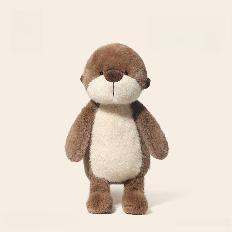 The JOOKI 36cm Otter Plush Toy, featuring soft brown and cream fur, stands upright against a light background—ideal as charming woodland nursery décor.