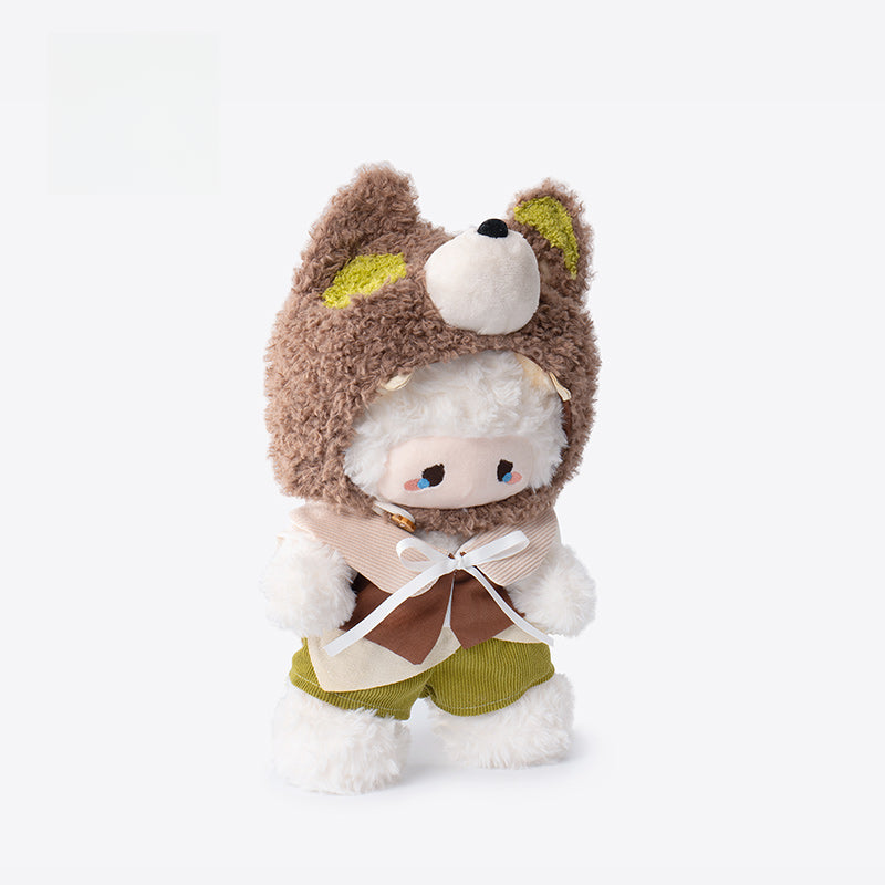 The ZEIO Sheep-Costume Lamb Plush Toy (29cm) is an adorable hooded doll with fluffy ears, white fur, green shorts, and a brown shirt—perfect as a cute nursery decoration.
