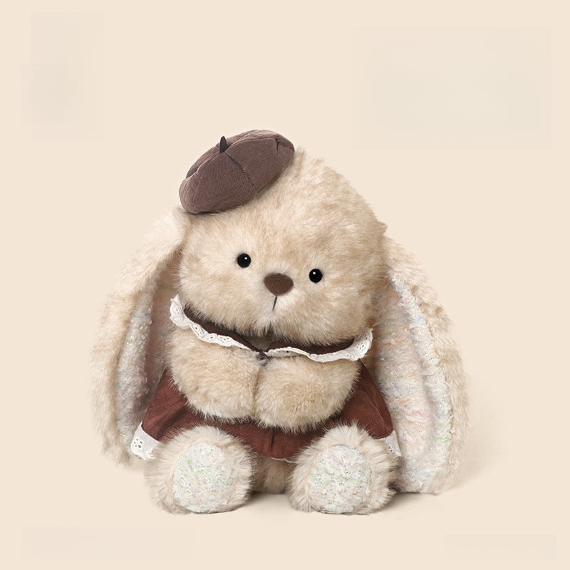 The JOOKI 35cm Cute Bunny Plush Toy features a soft stuffed rabbit with long ears, a brown beret, and a lace-trimmed dress, sitting upright on a plain beige background.