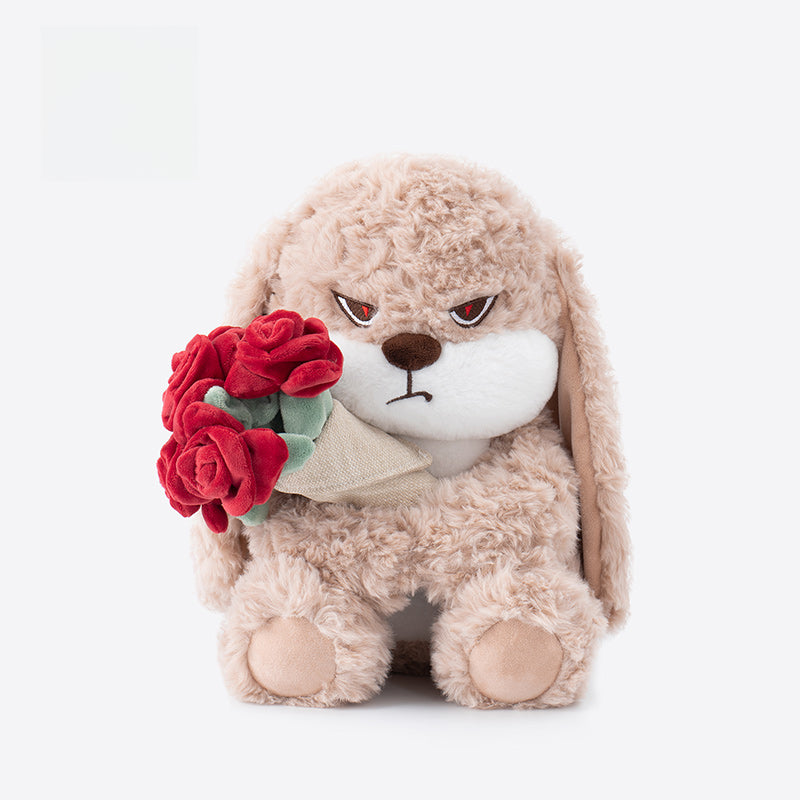 The ZEIO Rose-Holding Bunny Plush Toy 29cm is a soft rabbit doll with droopy ears, an angry expression, and a plush red rose bouquet, making it a unique touch for nursery décor.