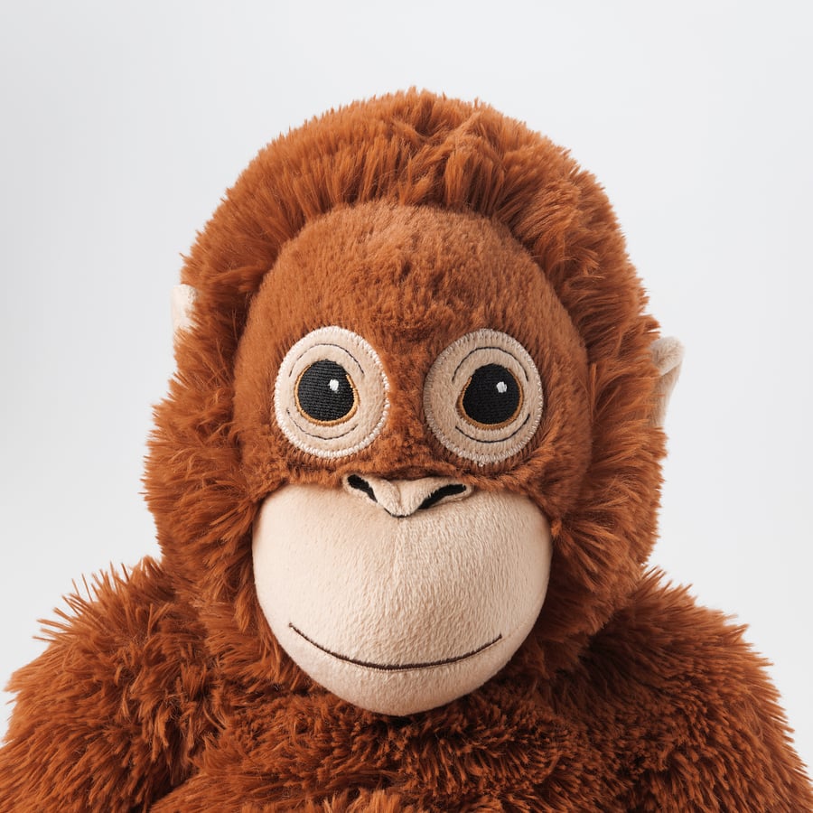 The ZoDoll Giant Punch Monkey Plush Toy, a viral Djungelskog orangutan stuffed animal with big round eyes and a neutral expression, is shown sitting against a plain white background.