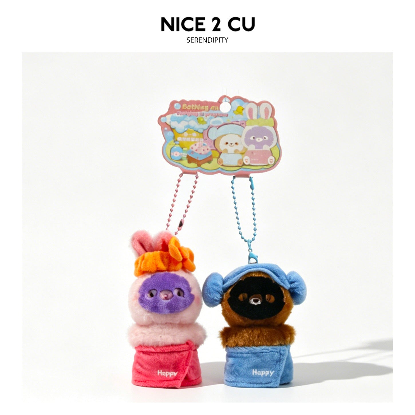 Pink bunny and brown bear kawaii plush charm pair with Happy embroidered towel bottoms on illustrated display card