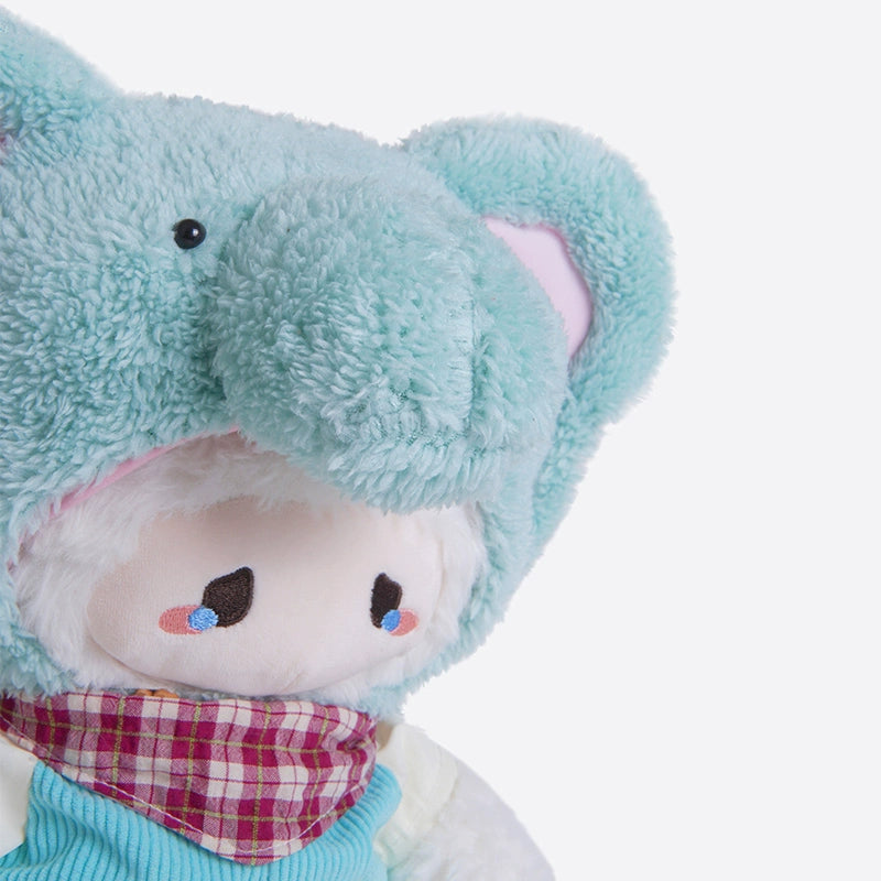 The ZEIO Elephant Plush Toy 29cm is a soft stuffed animal in a cozy blue costume with a plaid scarf, perfect for nursery décor or cuddling. Photographed on a plain white background.