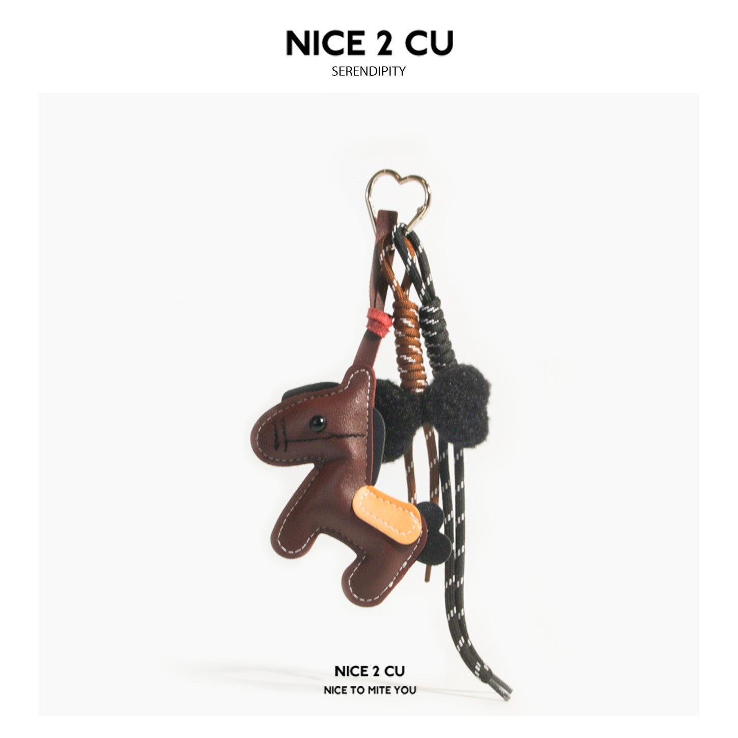 Brown leather-like horse bag charm keychain with black fluffy mane, heart clasp, and braided black-and-white cord